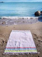 Peshtowel/towel in ice color with three different ribbons and a pom pom band