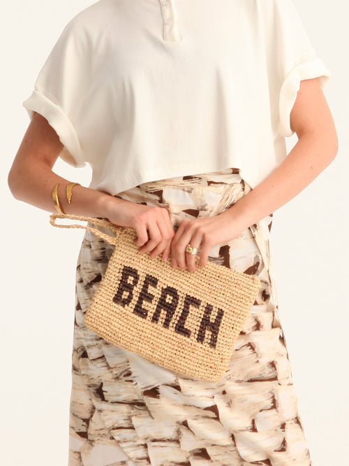 BEACH woven straw clutch