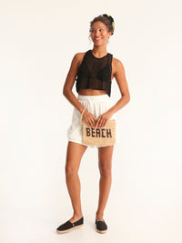 BEACH woven straw clutch