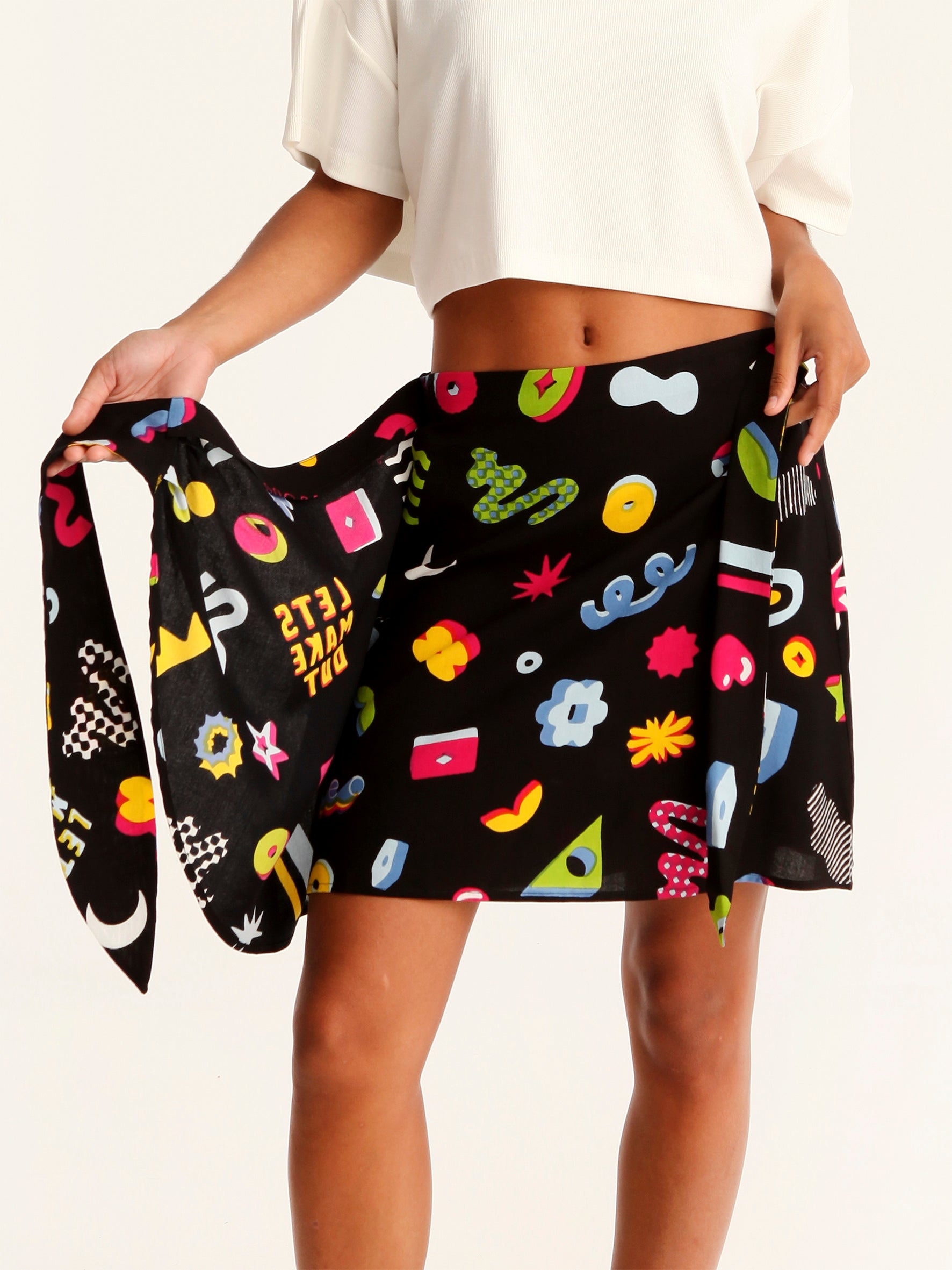 MORE AMOR mini wrap skirt