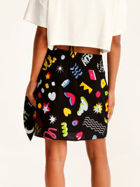 MORE AMOR mini wrap skirt