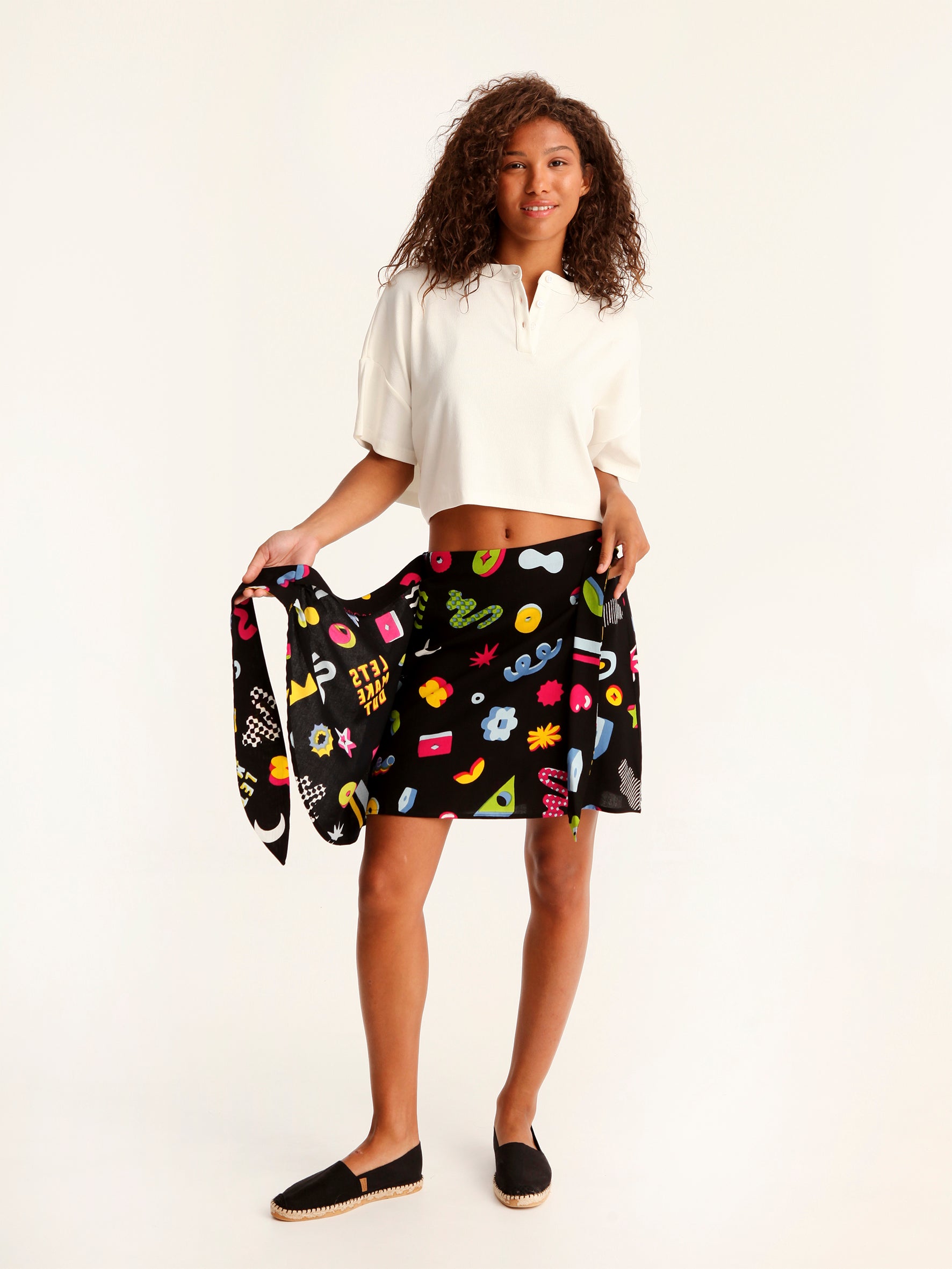 MORE AMOR mini wrap skirt