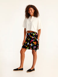 MORE AMOR mini wrap skirt