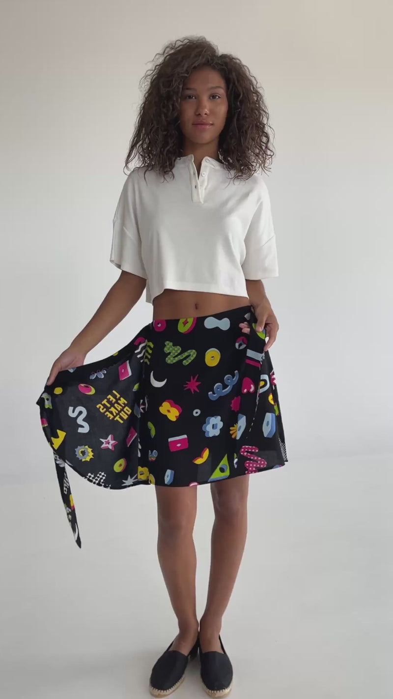 MORE AMOR mini wrap skirt