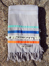 Peshtowel/towel in ice color with three different ribbons and a pom pom band