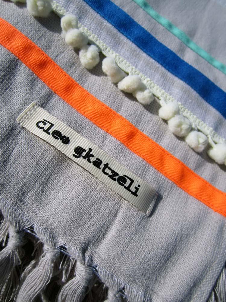 Peshtowel/towel in ice color with three different ribbons and a pom pom band