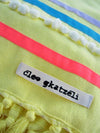 Peshtowel/towel in citron color with three different ribbons and a pom pom band