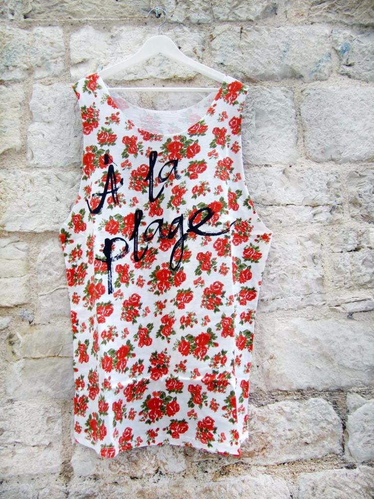 Muscle tee dress in multi floral color with a black A LA PLAGE print