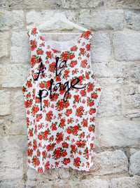 Muscle tee dress in multi floral color with a black A LA PLAGE print