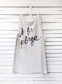 Muscle tee dress in lilac color with a black A LA PLAGE print