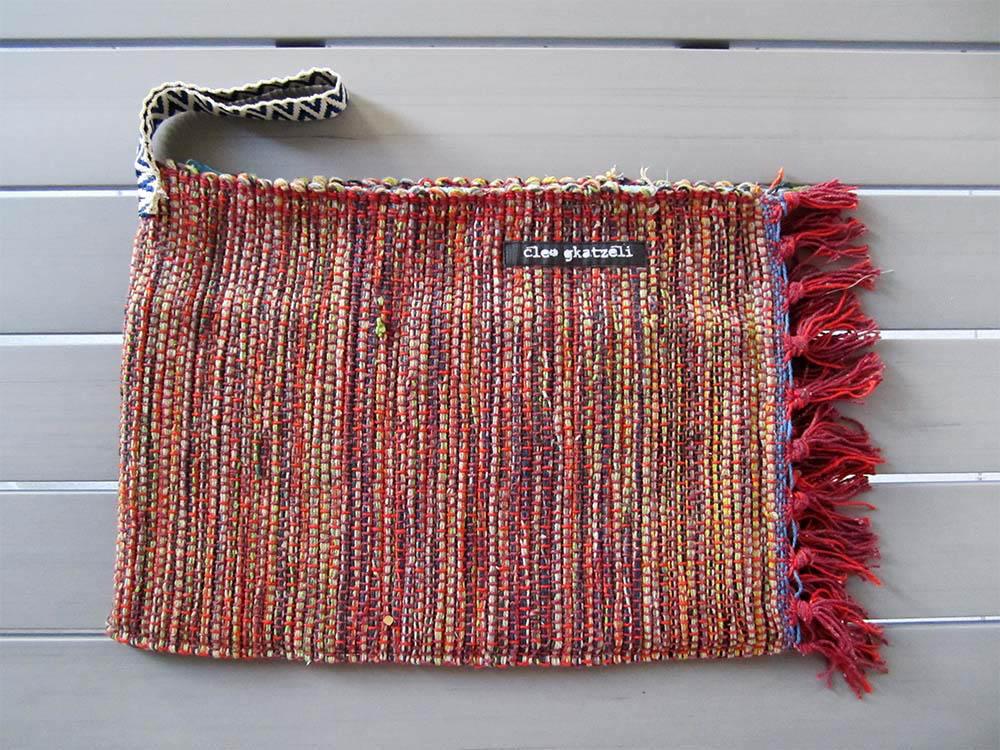 Rug clutch bag in brick color