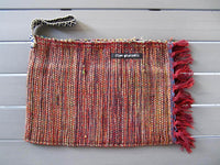 Rug clutch bag in brick color