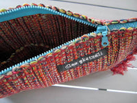 Rug clutch bag in brick color
