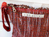 SPLASH - MULTI LOOM clutch bag