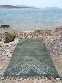 Peshtowel/towel in army stonewashed color with a grunge plain print in white colour 