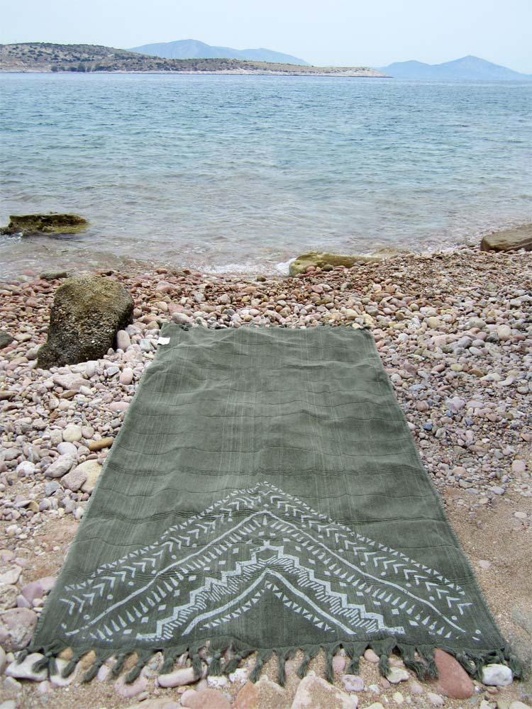 Peshtowel/towel in army stonewashed color with a grunge plain print in white colour 