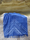 Peshtowel/towel in denim stonewashed color with a grunge plain print in white colour 