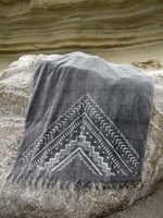 Peshtowel/towel in iron stonewashed color with a grunge plain print in white colour 