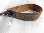 Leather bracelet with a bronze foil herringbone tape