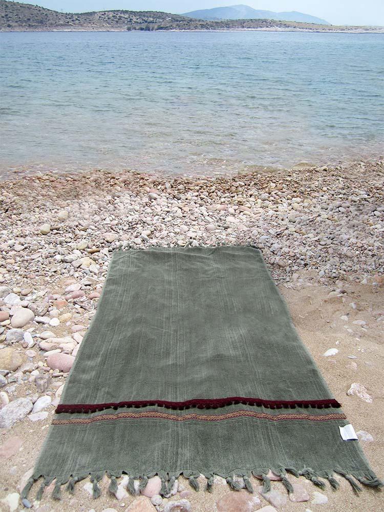 Peshtowel/towel in army stonewashed color with a woven ribbon and a fringed band