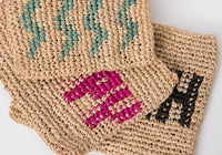 WAVES woven straw clutch