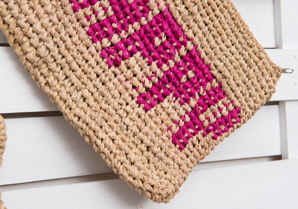 HAPPY woven straw clutch