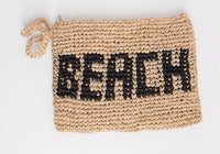 BEACH woven straw clutch
