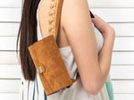 DIONE belt clutch bag